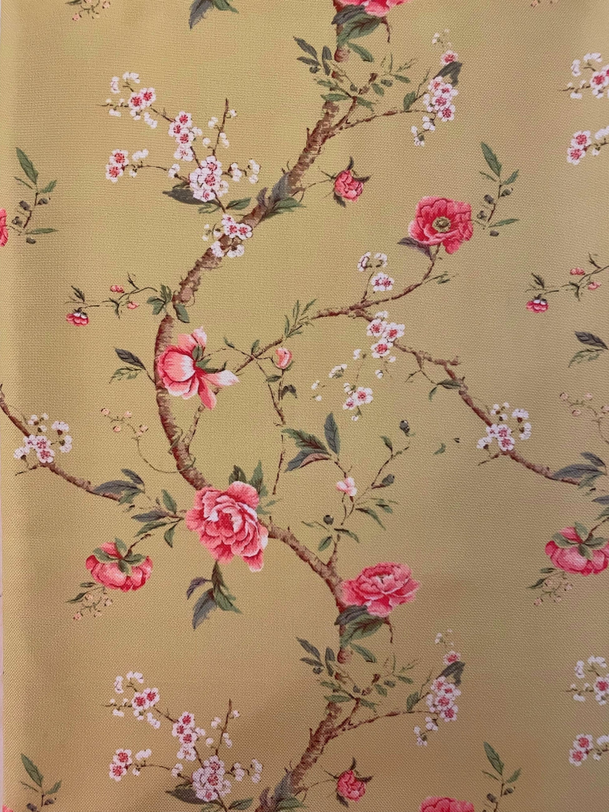 Floral pattern with pink flowers and green leaves on a beige background