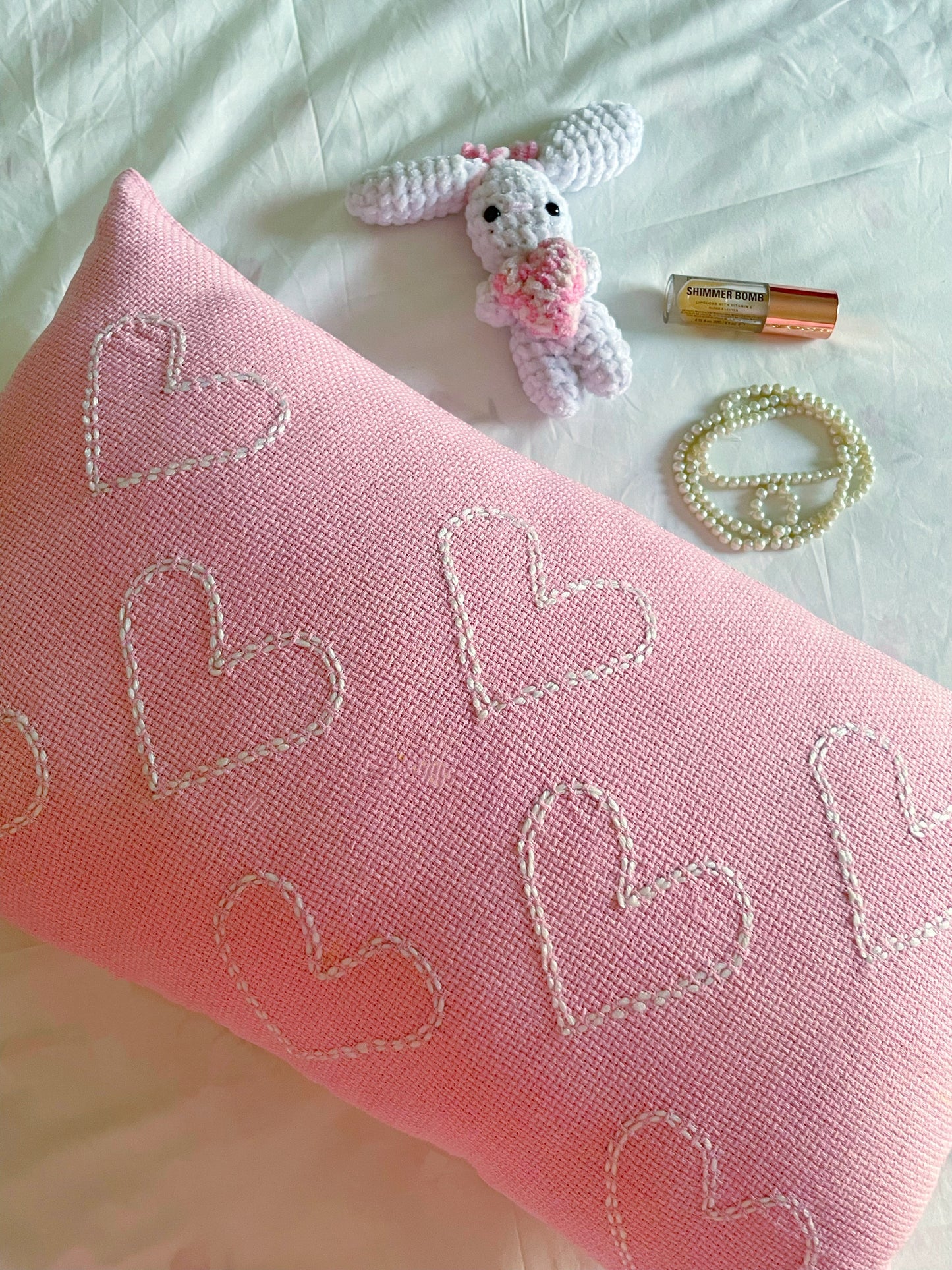 Pink Cushion with White Embroidered Hearts